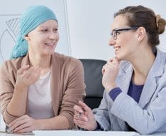 Cancer patient talking to doctor